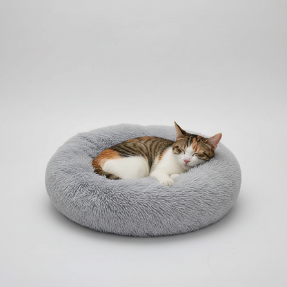 Plush donut calming pet bed