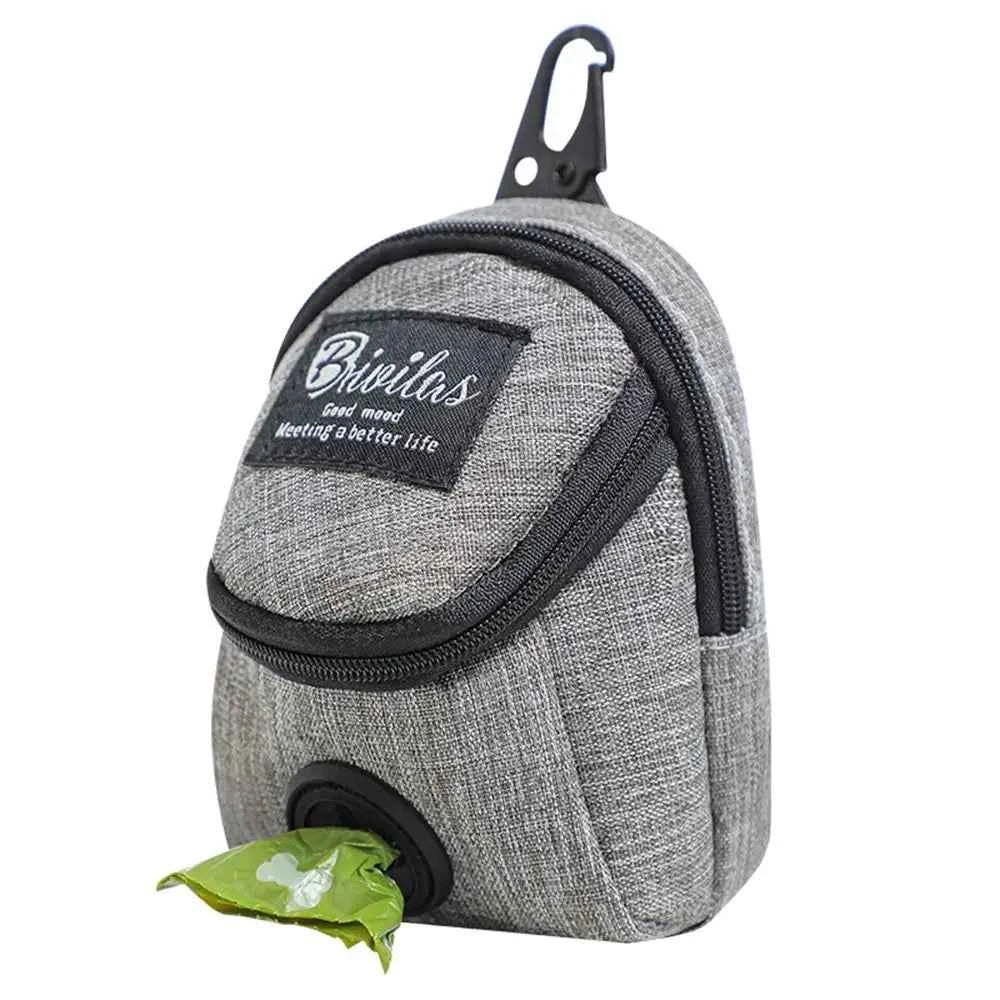 Dog treat pouch with built-in poop bag dispenser